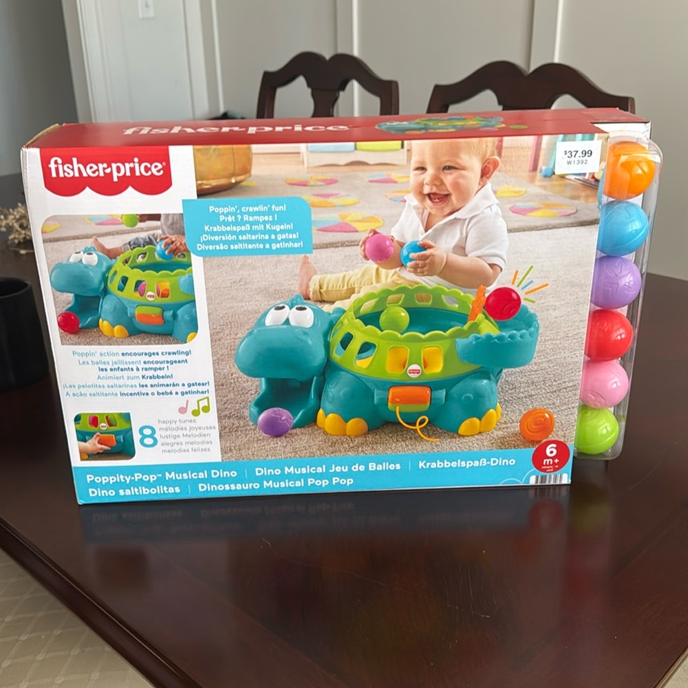 Fisher price poppity-pop musical Dino, NEW in box!